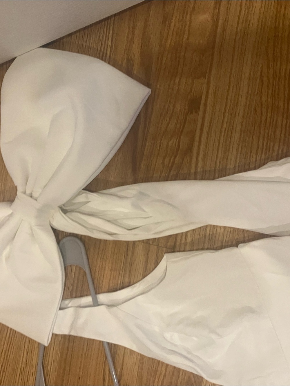 Lulu's white Sleeveless V-Neck Jumpsuit! With bow! - Picture 6 of 11